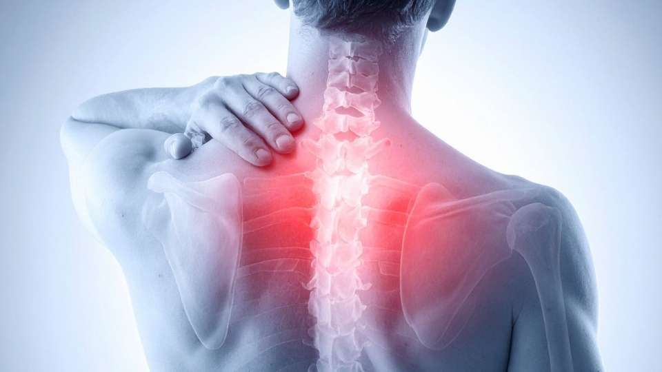 An image of a person with back or neck pain.